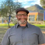 man with hat and glasses